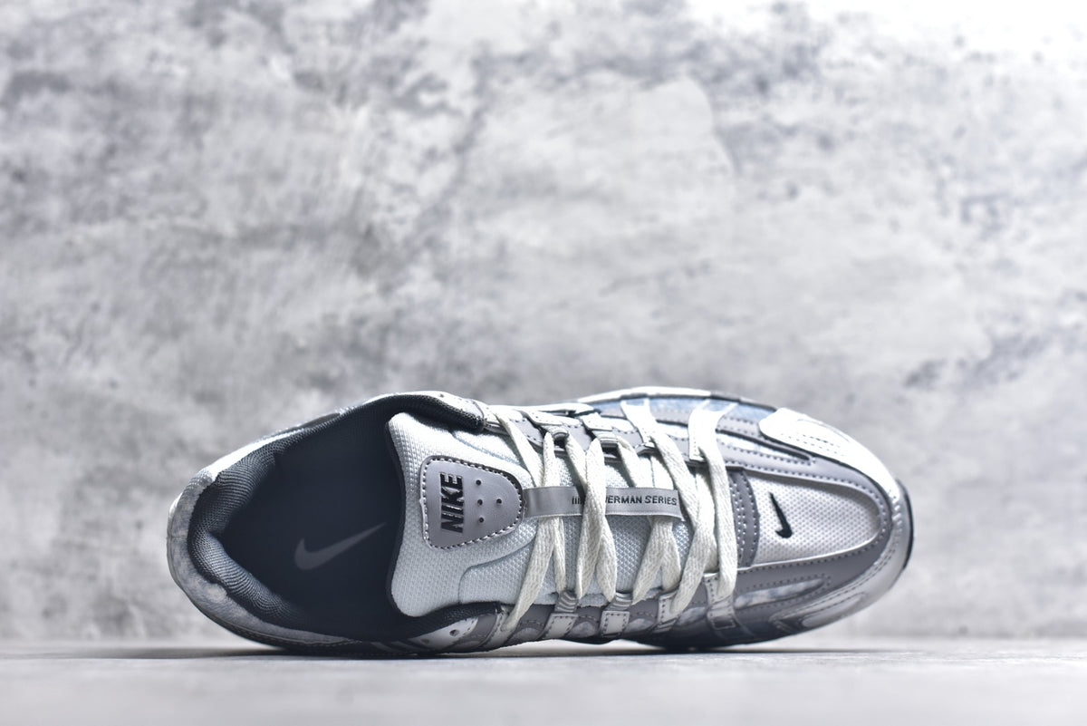Nike Retro Low-Top Dad Running Sneaker IH4465-095