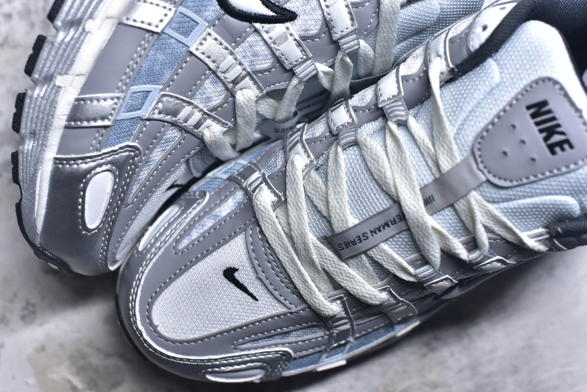 Nike Retro Low-Top Dad Running Sneaker IH4465-095